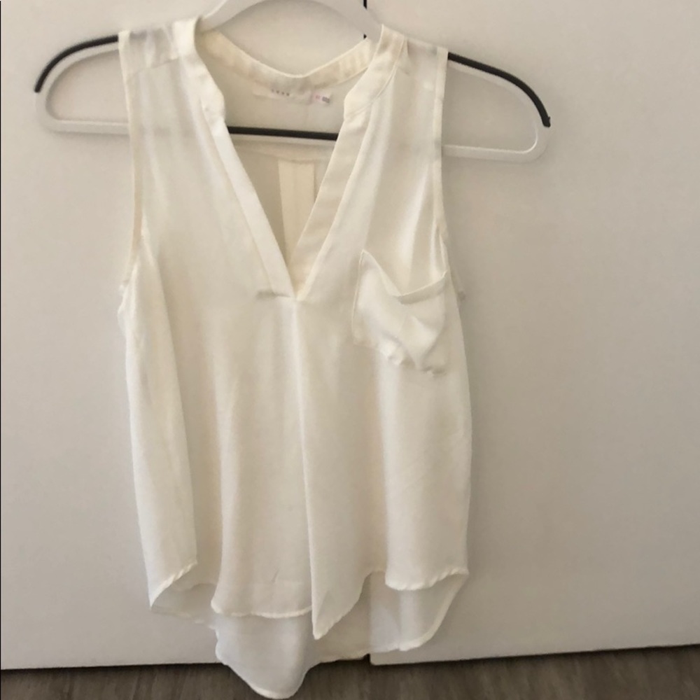 White sleeveless blouse